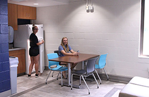 lockeroom kitchen, fridge and table